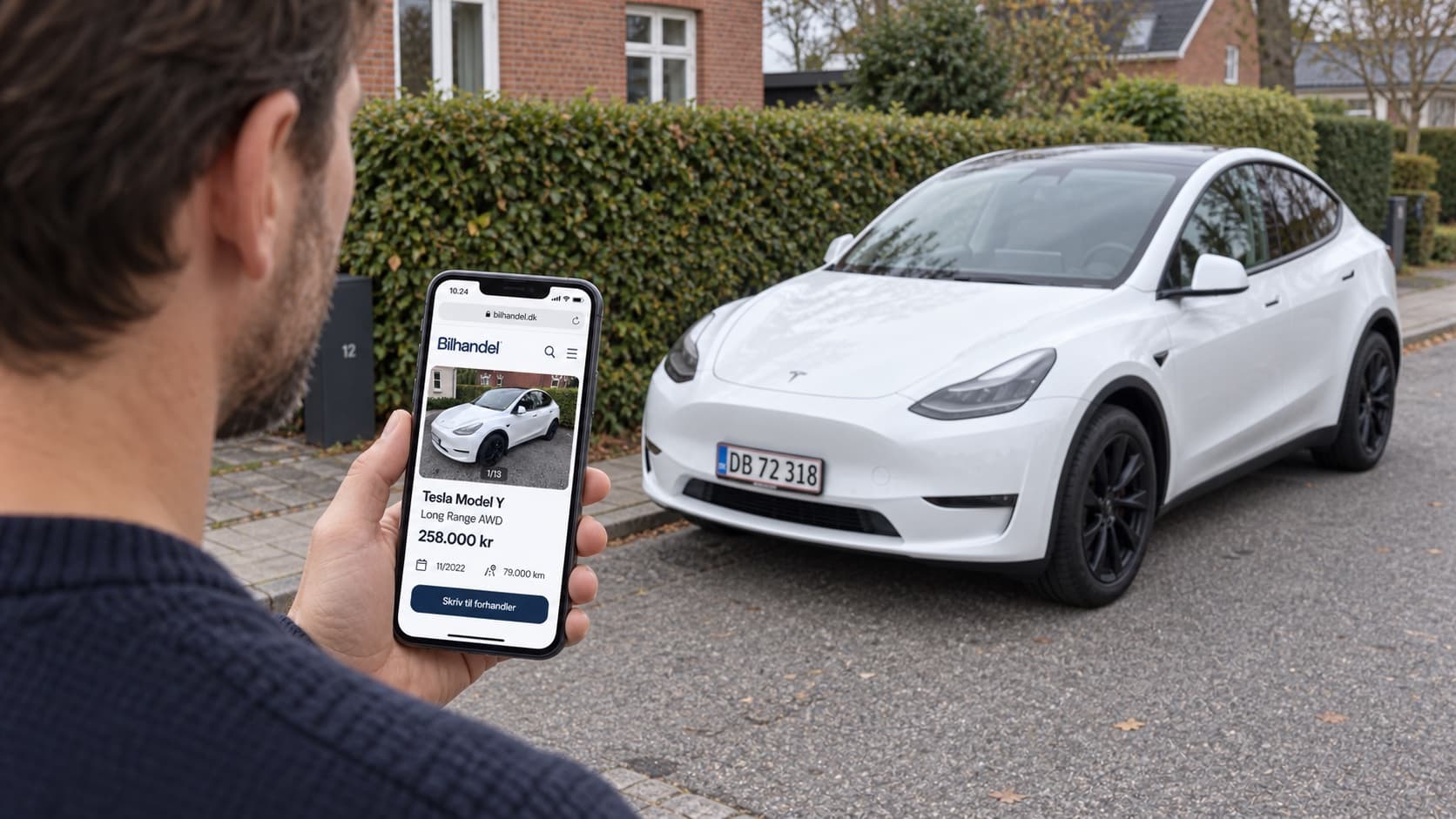 Checking a Bilhandel listing on a phone next to the car